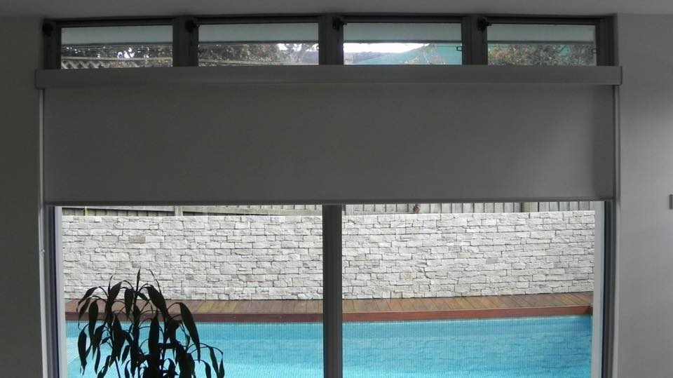 australian-made, grey block out roller blinds in a NSW home