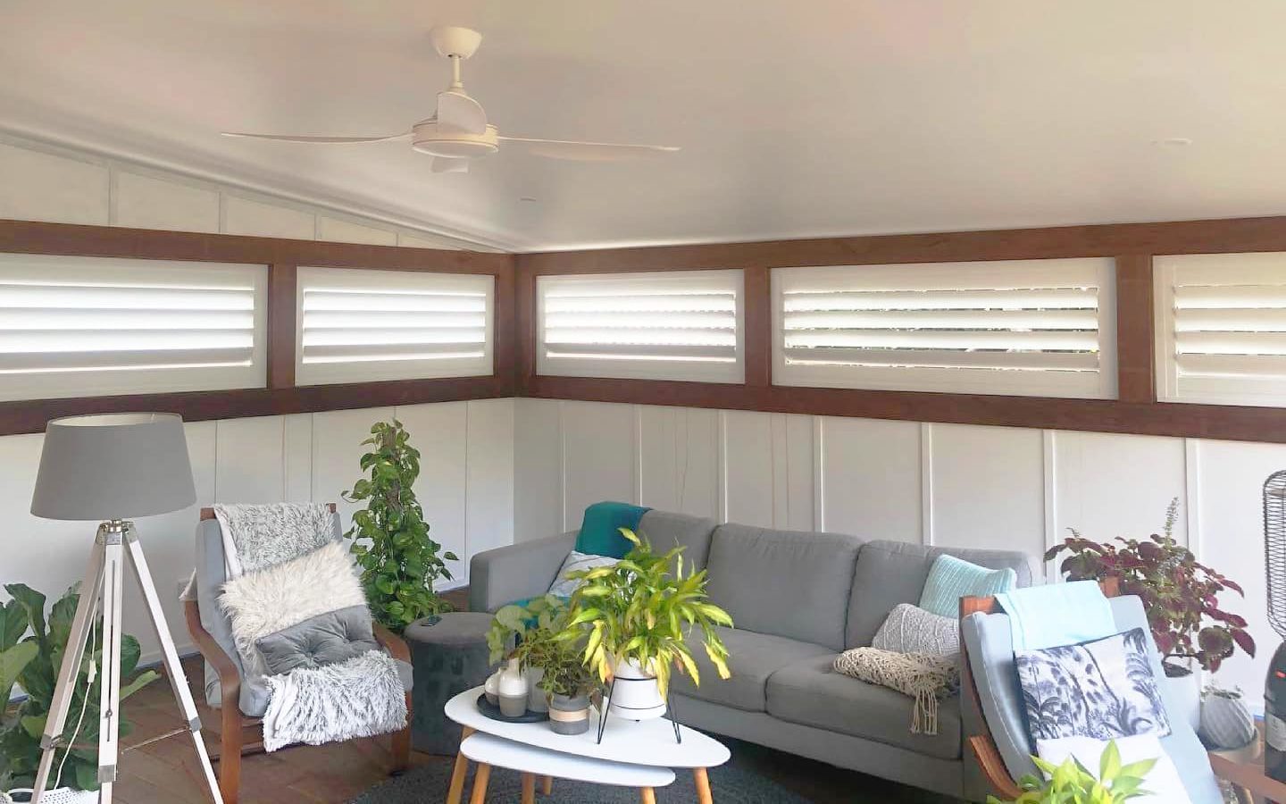 Coastal style home with plantation shutters