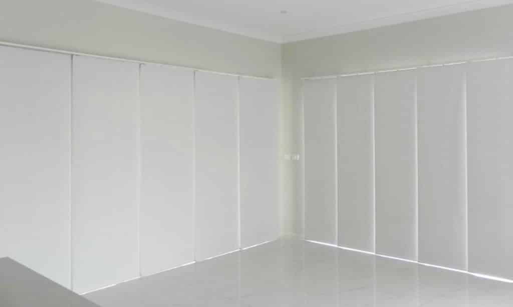 white panel glide blinds in a living space