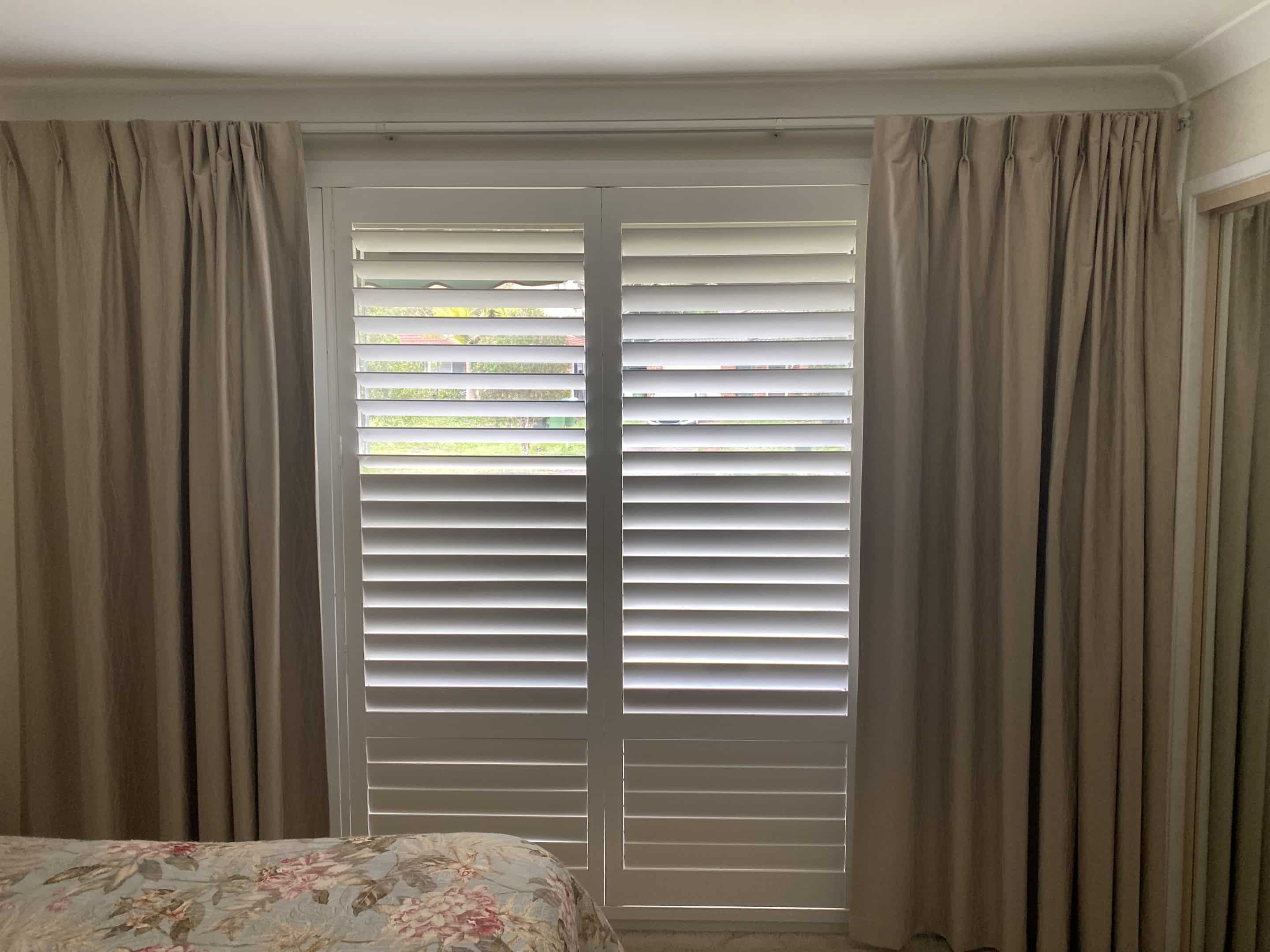 curtains and plantation shutters pairing