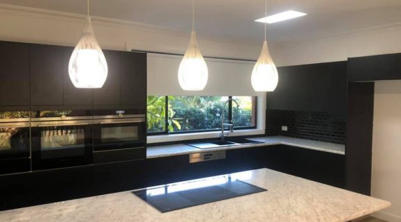 White Roller Blinds in Kitchen — Blinds, Shutters & Awnings in Wyee, NSW