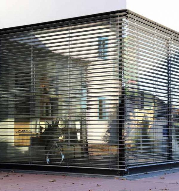 Window with modern shutter — Blinds, Shutters & Awnings in Wyee, NSW